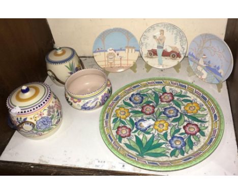 SECTION 8.  A Charlotte Rhead circular pottery wall plate with floral decoration, together with two Carter Stabler Adams bisc