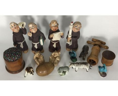A collection of Treen sewing accessories including a bobbin modelled as an egg, a pin cushion, a  small pin pot and a screwdr