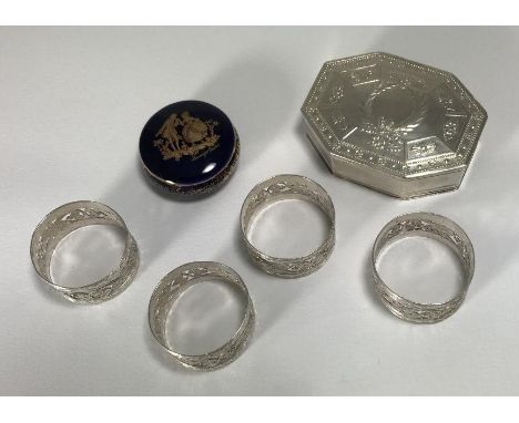 A French .800 grade silver trinket/pill box, of octagonal form, the hinged lid decorated with a relief moulded laurel wreath 