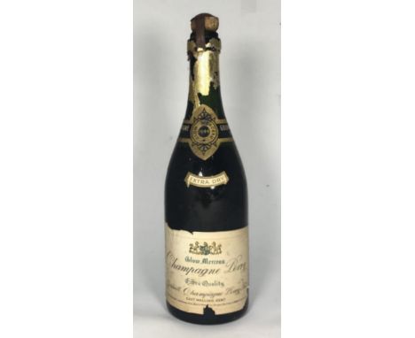 A 1944 Vintage Bottle of Glow Merceau Champagne Perry, Extra Dry, from Goldwell Champagne Perry Ltd.  Condition: Label with n