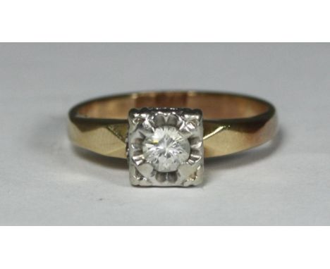 A yellow metal (tests as 14ct gold or above) ring, centrally set with a solitaire RBC diamond, total diamond weight approx. 0