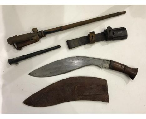 M1886 Lebel bayonet with cruciform blade and metal scabbard, together with a Nepalese Kukri knife, a leather frog and a short