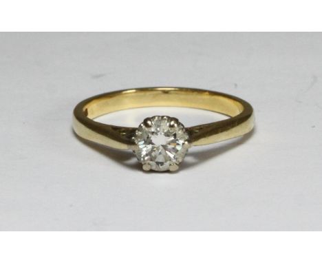 An 18ct gold ring, claw set with a solitaire RBC diamond, diamond weight approximately 0.70cts, gross weight approximately 3.