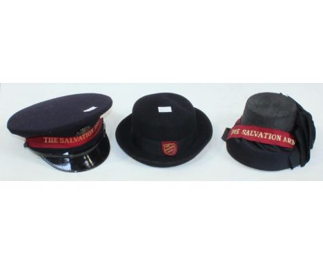 An early 20th century Salvation Army bonnet in leather hat case, together with a bowler hat and a peaked cap with badge readi