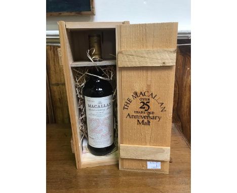 A 70cl bottle of The Macallan Anniversary Malt Over 25 Years Old, a special bottling of unblended single Highland malt Scotch