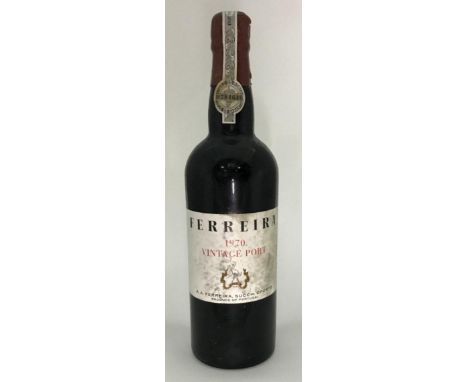 A bottle of Ferreira 1970 vintage port, signs of some seepage, in original branded tissue wrapper and housed in wooden crate 