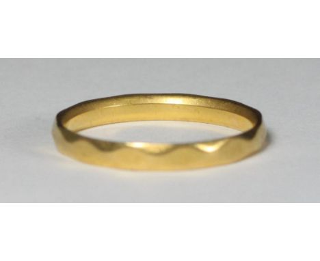 A 22ct gold wedding band of bevelled design, approx. 2.5g, ring size 'O' 