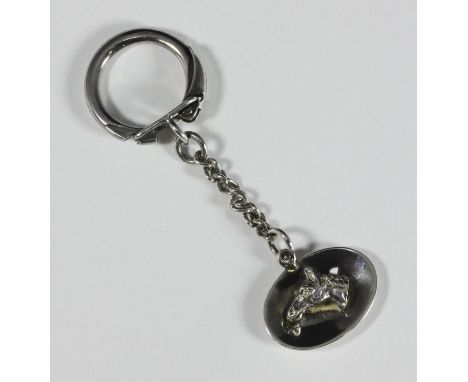 A silver key ring with horse-head pendant, pendant baring makers mark 'C&amp;C', hallmarked Birmingham, 1968, gross weight ap