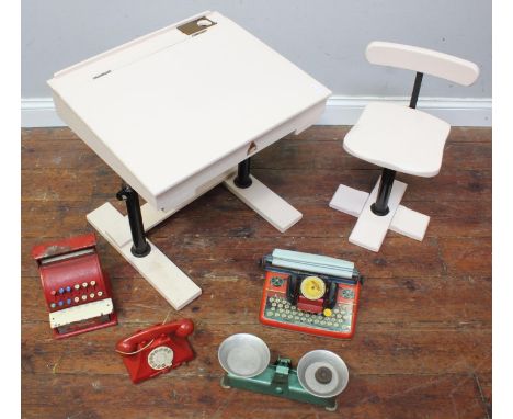 A painted Triang child's desk with metal supports, and chair, remains of label to desk, together with a Mettype Junior typewr