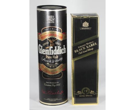 A bottle of Johnnie Walker Black Label Old Scotch Whisky, aged 12 Years, 1.125 litre bottle in original box, together with a 