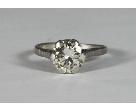 A solitaire diamond ring, round transitional cut, spreading approximately 2-carats VS clarity J/K colour, set in unmarked whi