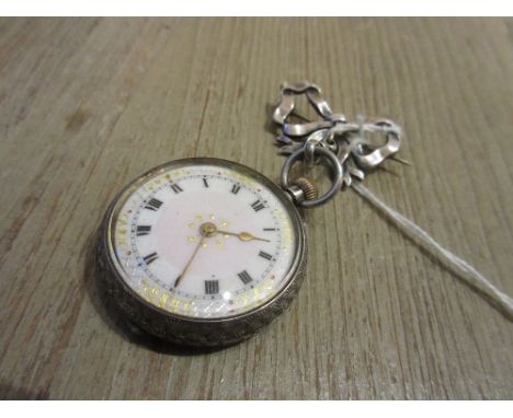 Ladies silver cased open face fob watch with bow pin and enamel dial with Roman numerals 