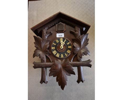 20th Century Black Forest wall clock, together with a Continental walnut three train mantel clock 