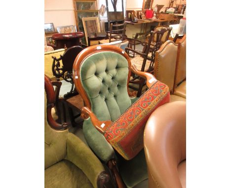 19th Century spoon back button upholstered armchair on shaped front supports with castors (at fault) and a modern square stoo