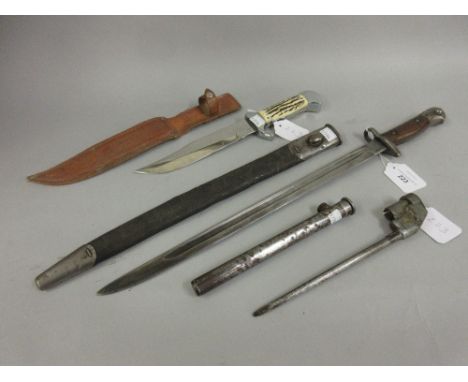 World War I bayonet, marked Wilkinson 1907, in leather and metal scabbard, a spike bayonet with steel sheath and a later chro