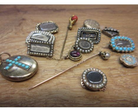 Small collection of 19th Century mourning brooches together with two stick pins etc. 