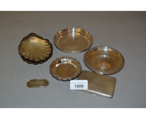 Pair of silver scallop shaped dishes, various silver and white metal trinket dishes, wine label and a cigarette case 