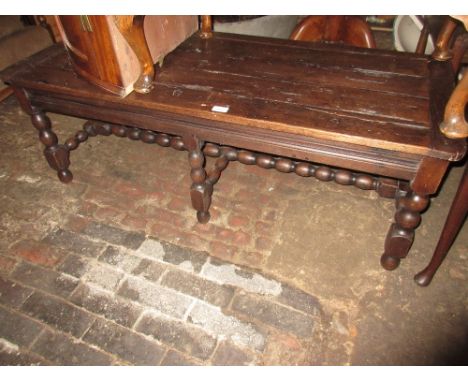 Antique and later oak rectangular coffee table on bobbin turned front supports, 21ins x 50ins x 18.5ins high 