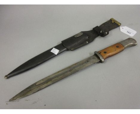 German bayonet with scabbard, the 9.5in blade inscribed 44ASW 