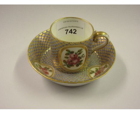 18th Century Sevres porcelain cabinet cup and saucer painted with panels of roses within blue and gilt fish scale ground, sig