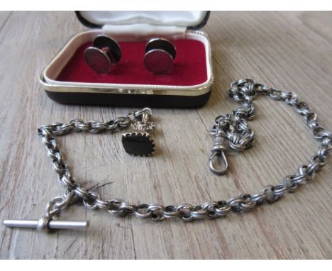 Pair of silver coin cufflinks, a silver watch chain mounted with a gilt metal fob seal 