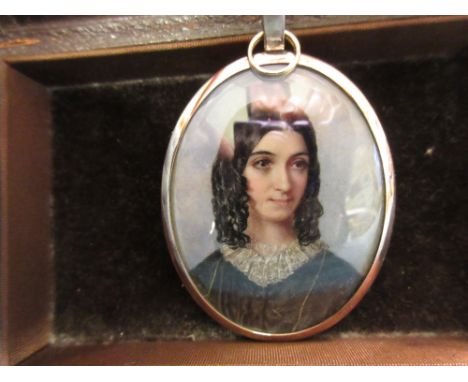 Mid 19th Century miniature oval portrait of a young lady with lace collar, inscribed verso ' W. Tiffin, London 1854 ', bearin