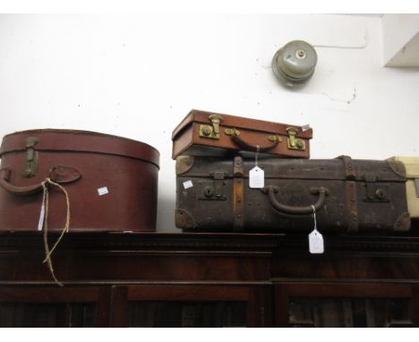 Vintage circular leather hat box, small leather suitcase and a simulated leather wooden bound travel trunk 