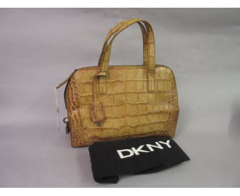D.K.N.Y. leather simulated crocodile handbag, with dust cover 