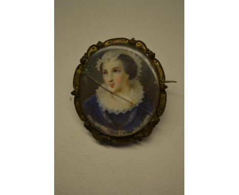 Portrait miniature of a lady wearing a lace bonnet and ruff collar with blue dress and gilt metal mount, mother of pearl back