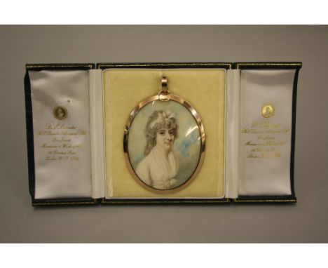 George III English oval miniature portrait on ivory of a young woman in white dress with bow in her hair, unsigned, in a gold