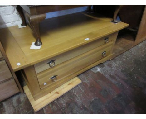 Modern light oak rectangular coffee table / two drawer chest together with an early 20th Century beech and fruitwood spinning