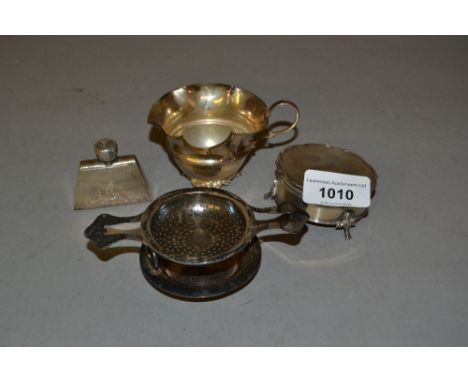 Small silver cream jug, silver tea strainer, miniature Continental silver perfume flask and a trinket box (at fault) 