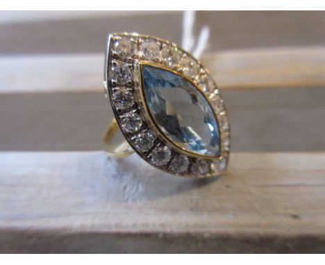 18ct Yellow gold aquamarine and diamond marquise cluster ringRing size N. This has a white gold outer edge only. It is a mode