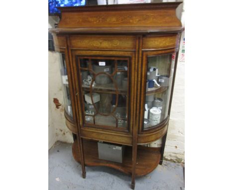 Edwardian mahogany and marquetry inlaid display cabinet, the low shaped back above a central bar glazed door flanked by bow g