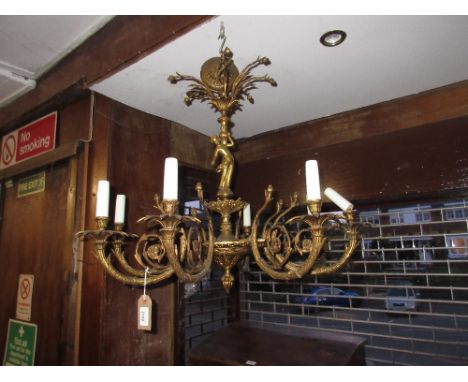 Mid 20th Century gilt brass eight light electrolier with figural column and a smaller three branch chandelier 