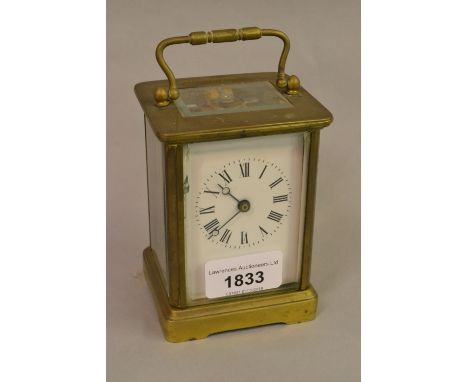 Small brass cased single train carriage clock 