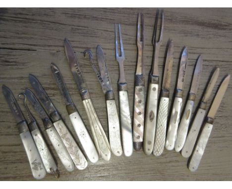 Group of three 19th Century silver and mother of pearl folding forks, two small silver and mother of pearl handled button hoo