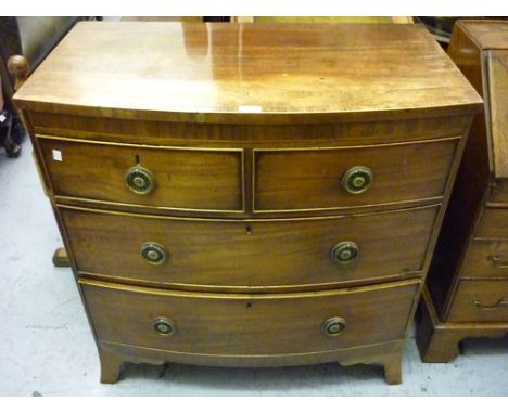 Small 19th Century mahogany and line inlaid bow fronted chest of two short and two long drawers with circular ring handles ra