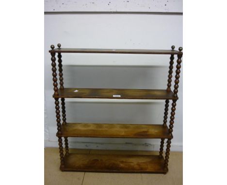 Stained beechwood four tier wall bracket with bobbin turned uprights 