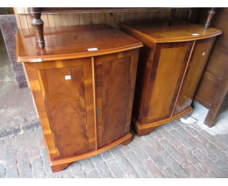 Pair of reproduction yew wood two door bow fronted bedside cabinets together with a reproduction yew wood two drawer filing c