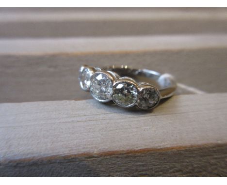 Platinum ring set five graduated brilliant cut diamonds, approximately 1.50ct totalSize M/N 
