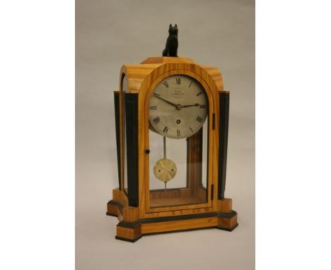 David Linley Furniture, satinwood and ebony mounted dome shaped mantel clock with brown patinated dog figure surmount, the ci