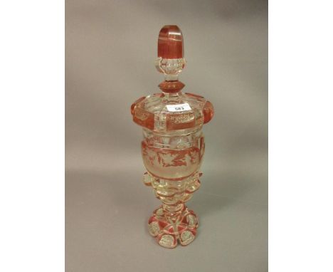 19th Century Bohemian Red Flash and etched glass pedestal jar and cover, decorated with a stag hunting scene, 17ins tallTwo l
