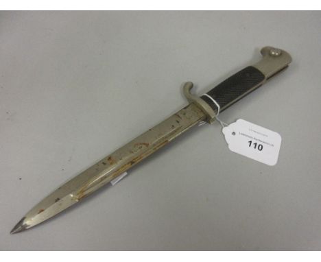 German bayonet with stylised eagles head pommel, the 7.5in blade inscribed W.K.C. (minus scabbard) 