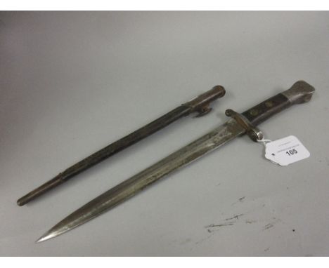 German bayonet with a scabbard, the 11.75in blade inscribed W.R. below a crown 