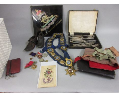 Quantity of Order of the Buffalo medals, sash, bag etc., pair of early 20th Century leather and wooden clogs, a reverse glass