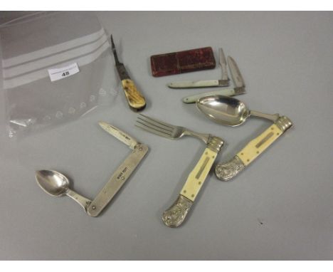 Georgian silver and mother of pearl handled campaign knife and fork in original case, a 19th Century campaign spoon and fork,