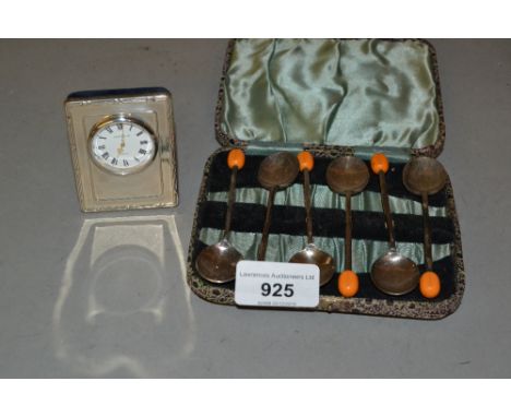 Cased set of six silver coffee spoons and a modern silver mounted bedside clock 