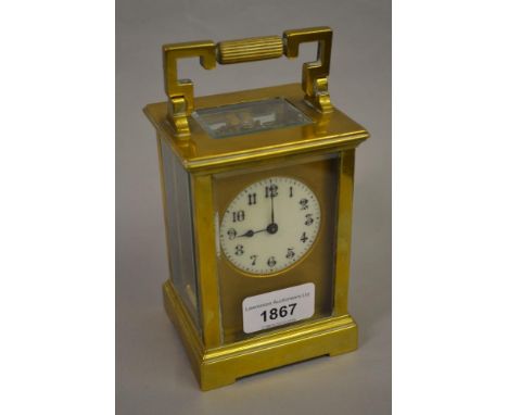 Early 20th Century brass cased carriage clock with enamel dial and single train movement 