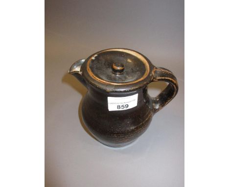 Bernard Leach, stoneware hot water pot and cover of plain baluster form with mottled glaze, St. Ives pottery mark and Bernard